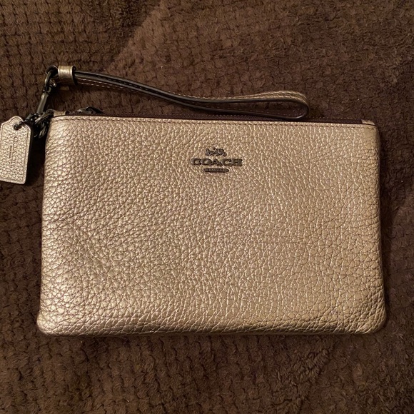 Shimmery gold Coach wristlet - Picture 1 of 3